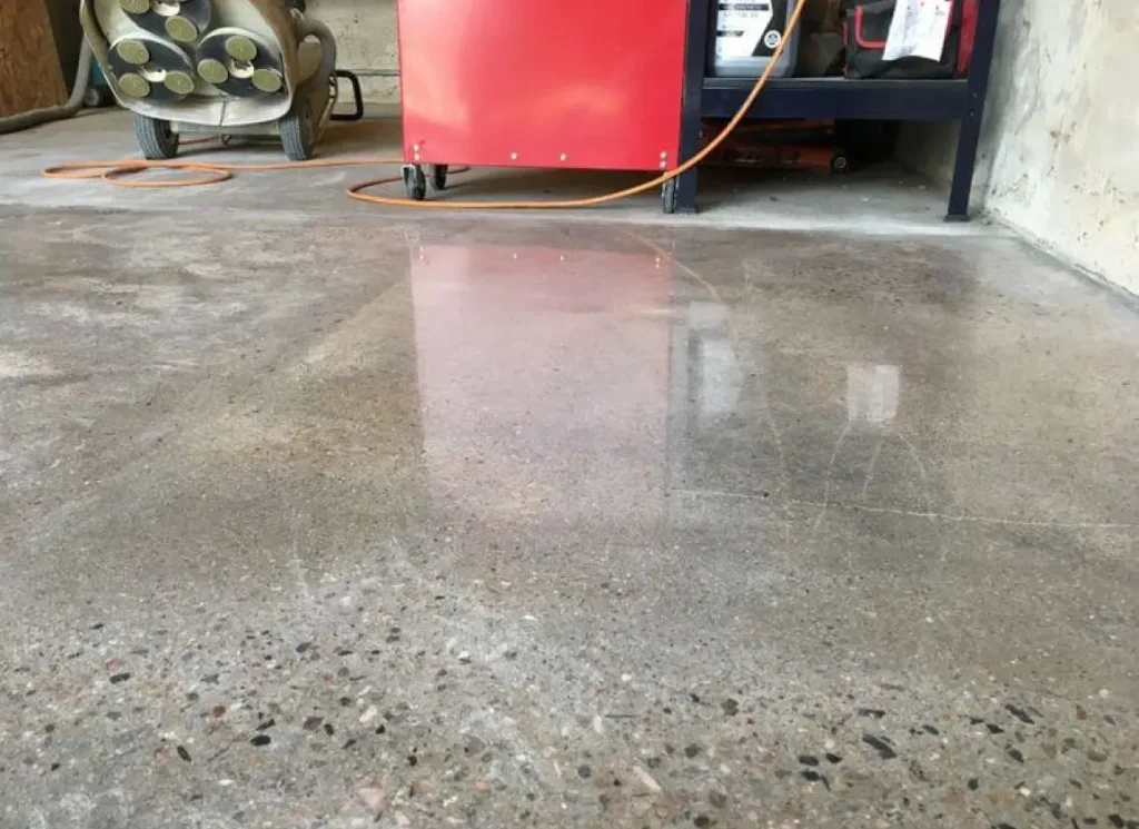 Concrete floor with a salt and pepper polish finish.